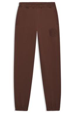HUGO Logo-artwork tracksuit bottoms in cotton terry - Brown Women's Pants