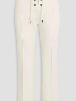 Lace-up cotton-blend crepe flared pants