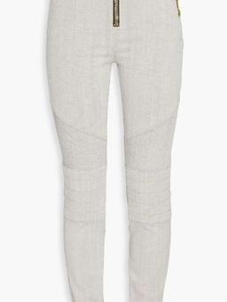 Studded high-rise slim-leg jeans