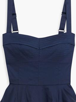 Carnegie ruffled quilted cotton-blend top